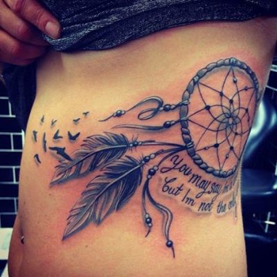  Tatouage attrape rêve avec des oiseaux qui s'envolent vers le ventre